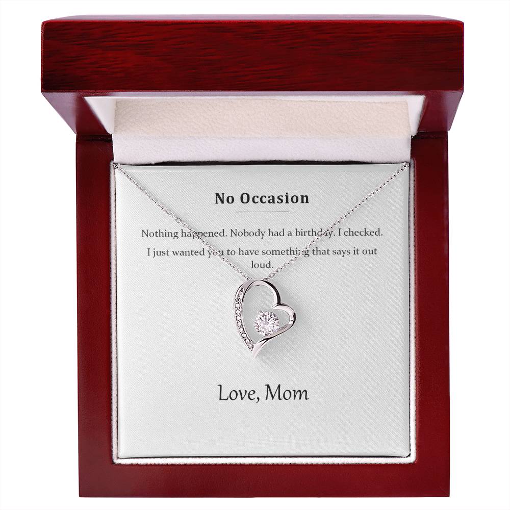 Silver heart necklace and message card in the mahogany-style luxury gift box