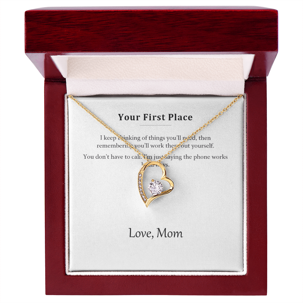 Gold heart necklace and message card in the mahogany-style luxury gift box