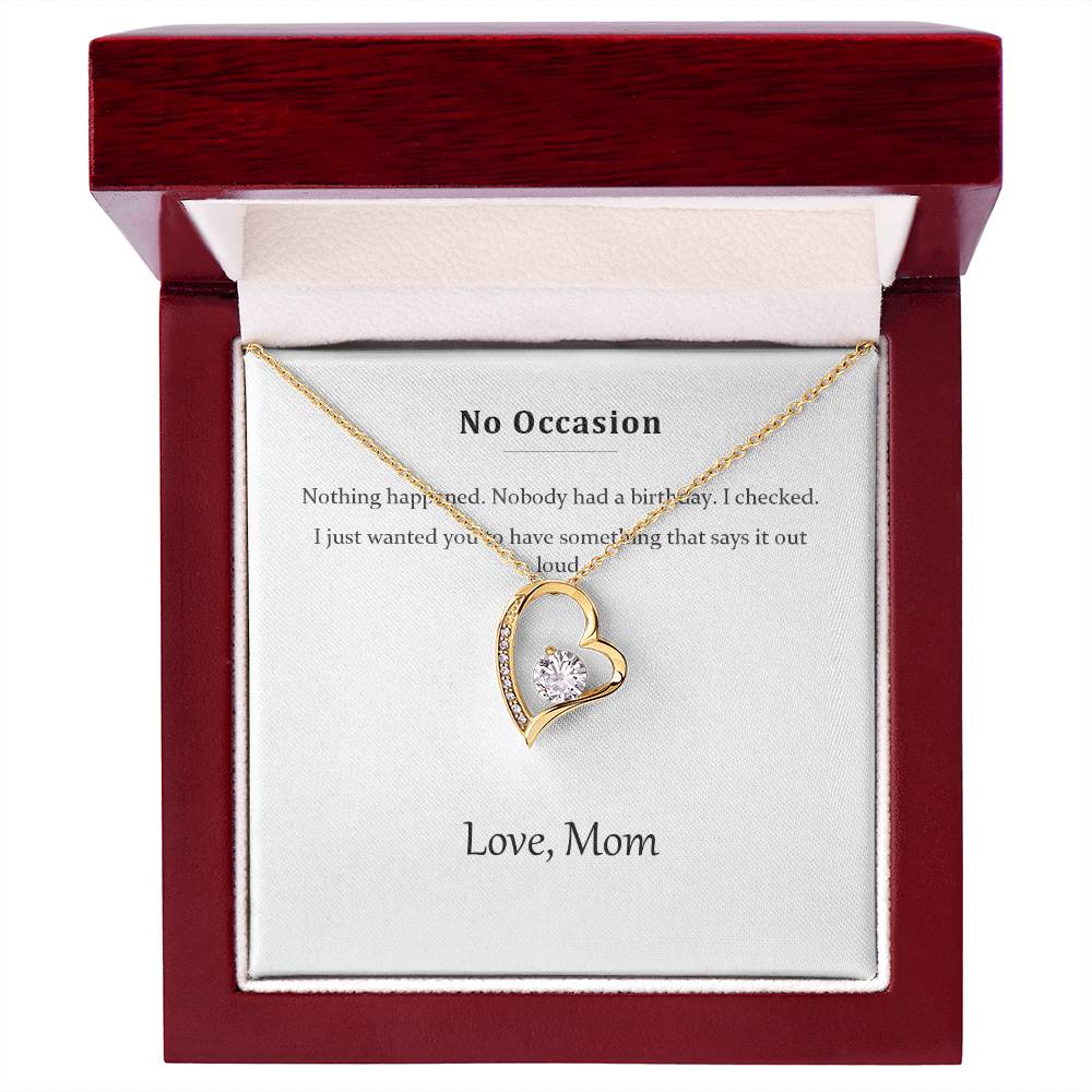 Gold heart necklace and message card in the mahogany-style luxury gift box