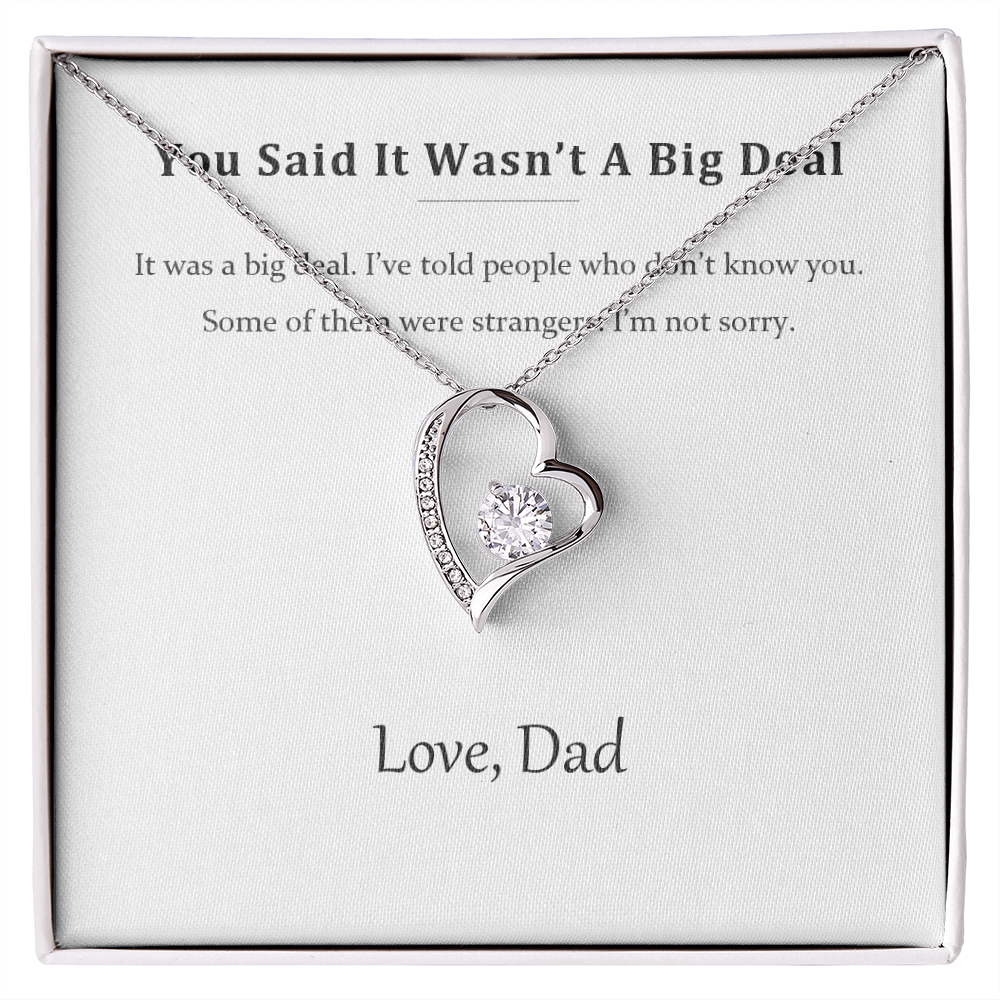Silver heart pendant necklace on a printed message card reading You Said It Wasn't A Big Deal, in a white gift box