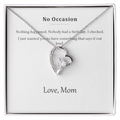 Silver heart pendant necklace on a printed message card reading No Occasion, in a white gift box