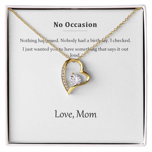 Gold heart pendant necklace on the No Occasion message card in a white gift box