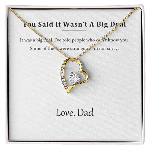 Gold heart pendant necklace on the You Said It Wasn't A Big Deal message card in a white gift box